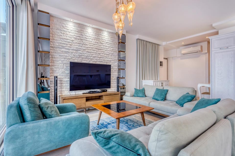Communal lounge/ TV room, Living room, Seating area, air conditioner