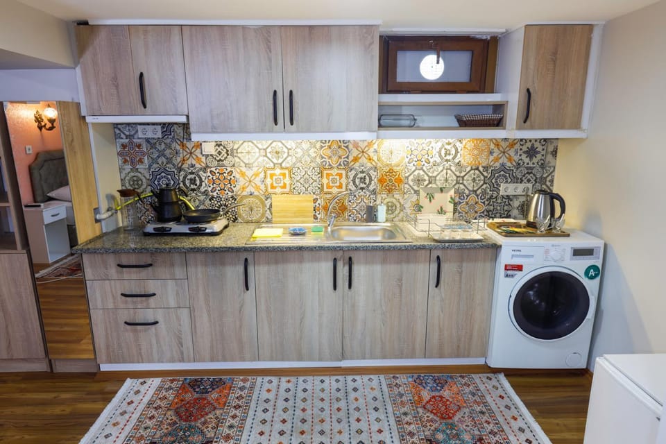 Coffee/tea facilities, Kitchen or kitchenette, stove, washing machine, dryer