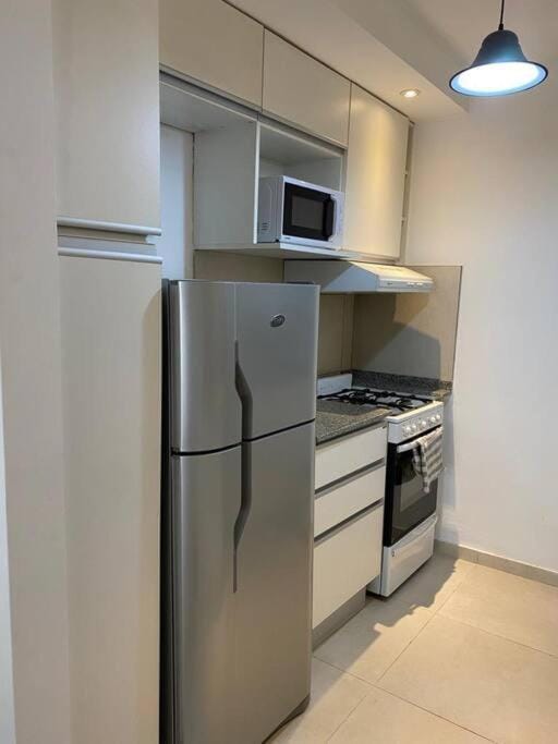 Departamento para 4 personas, con cochera, a metros del centro de la ciudad Apartment in Rosario