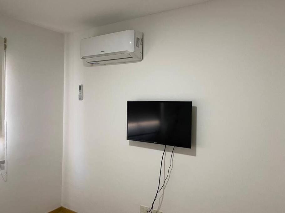 Departamento para 4 personas, con cochera, a metros del centro de la ciudad Apartment in Rosario