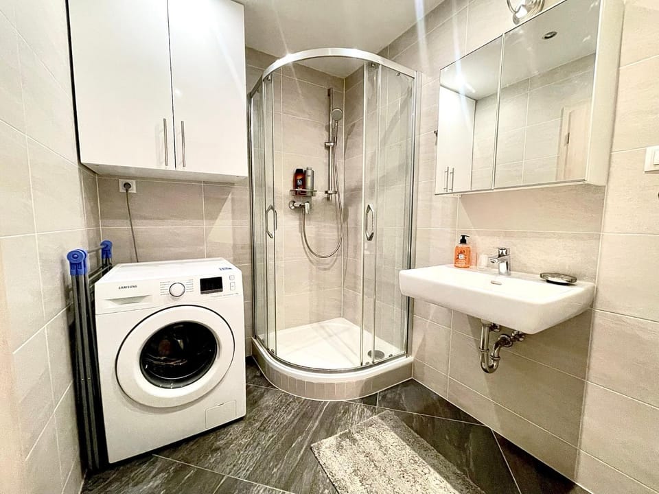 Shower, Bathroom, towels, washing machine, dryer