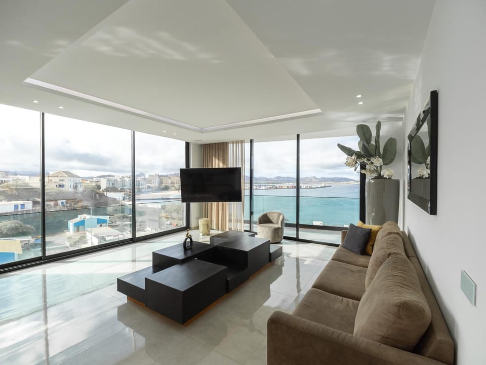 Communal lounge/ TV room, TV and multimedia, View (from property/room), View (from property/room), Living room, Seating area, Beach, Mountain view, Mountain view, Sea view, Street view, Quiet street view, internet, air conditioner, air conditioner