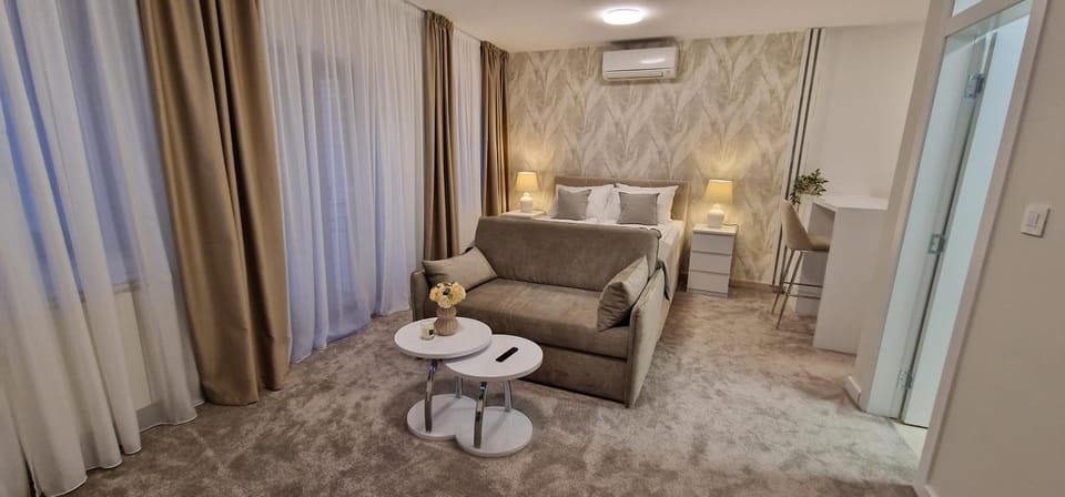 Bed, Living room, Seating area, Bedroom