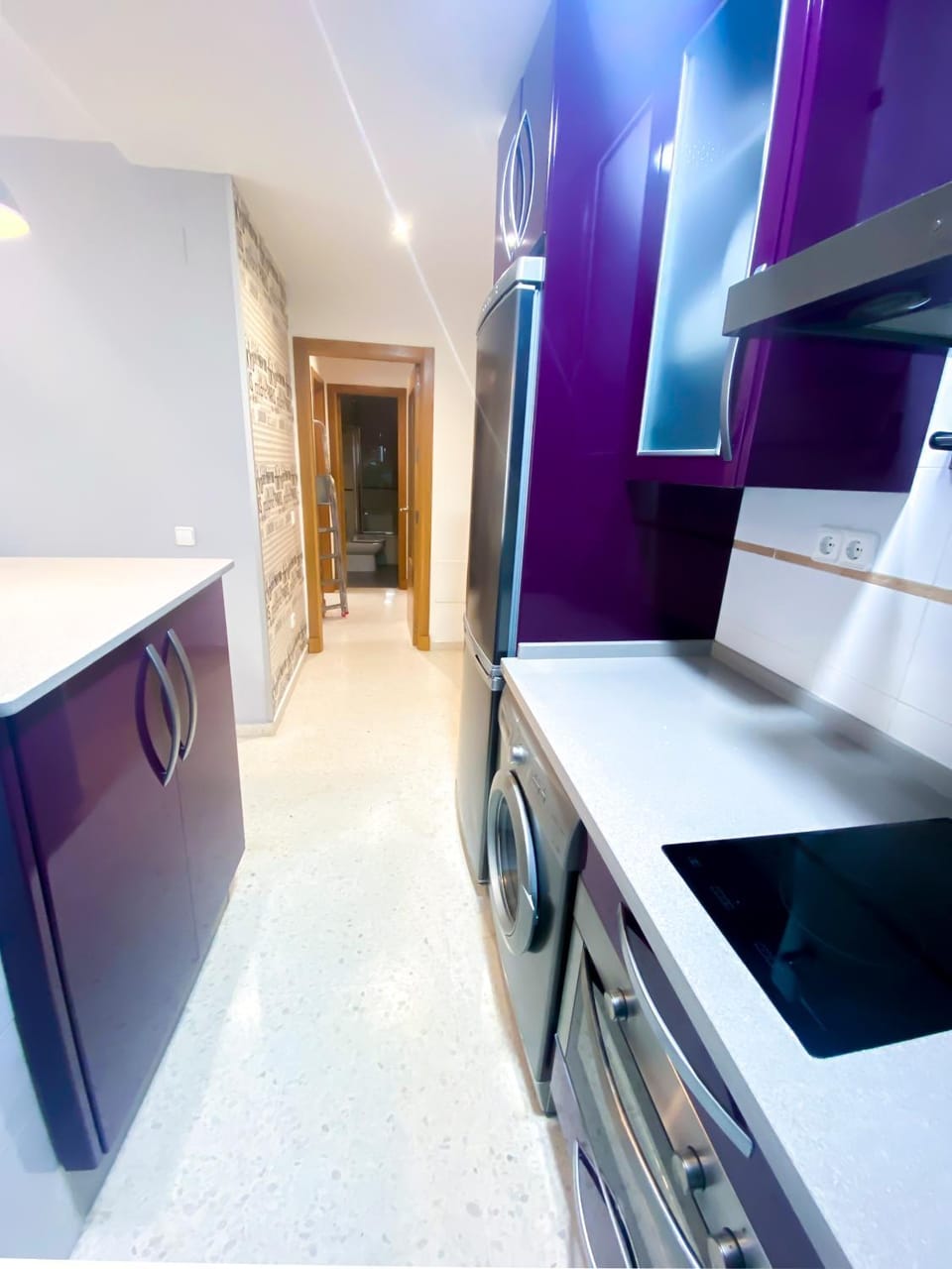 Kitchen or kitchenette, dishwasher, oven, washing machine