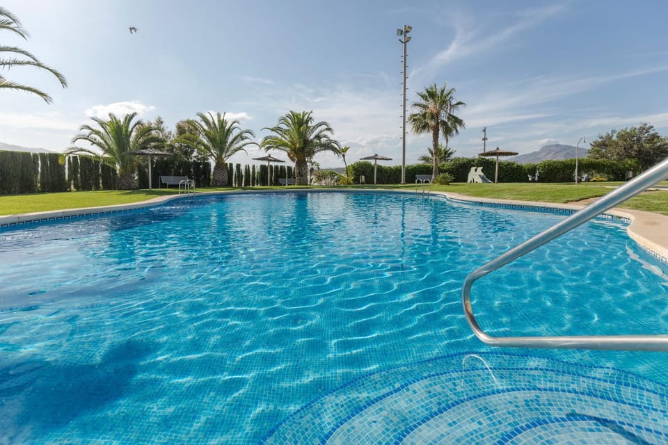 Property building, Living room, Swimming pool