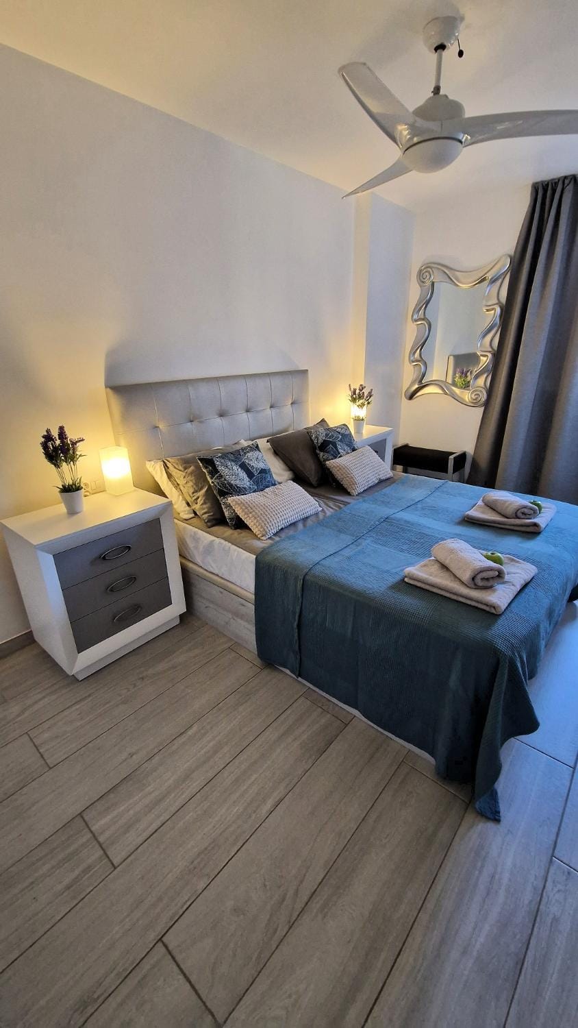 Bed, Bedroom, fireplace, towels