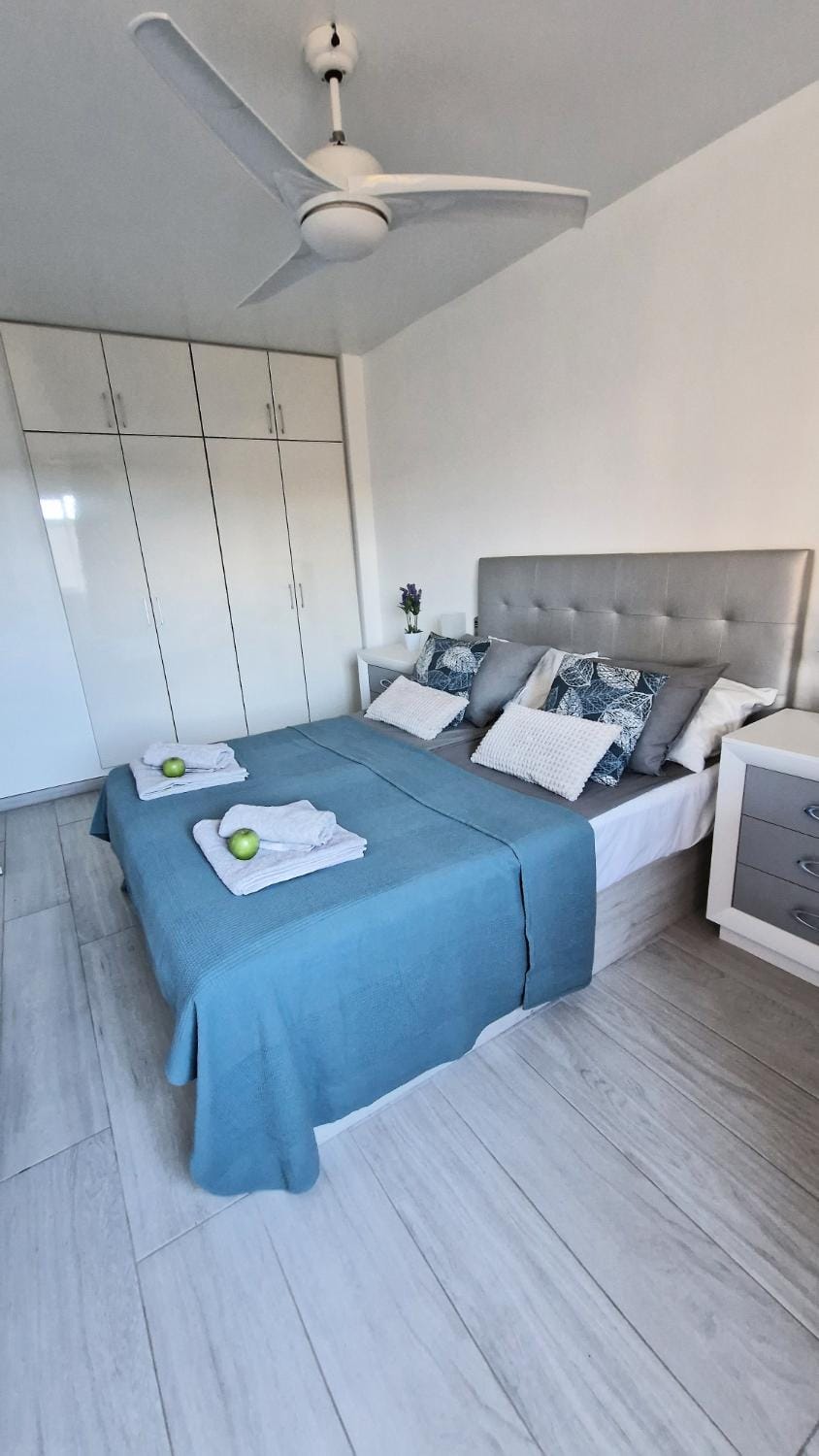 Bed, Bedroom, fireplace, towels, wardrobe