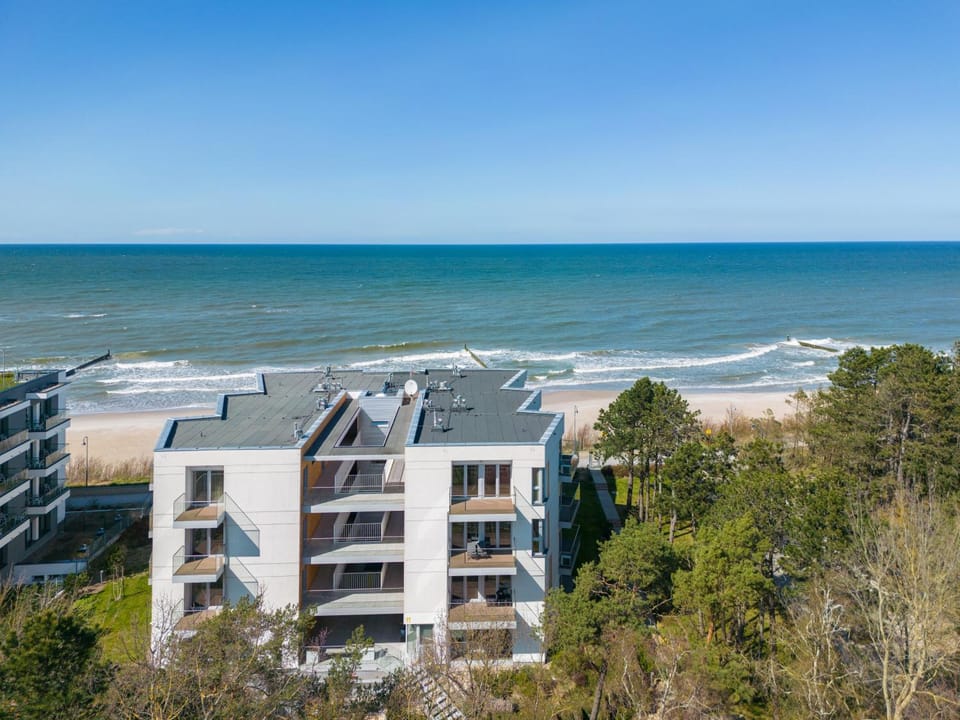 Property building, Day, Natural landscape, Beach, Sea view