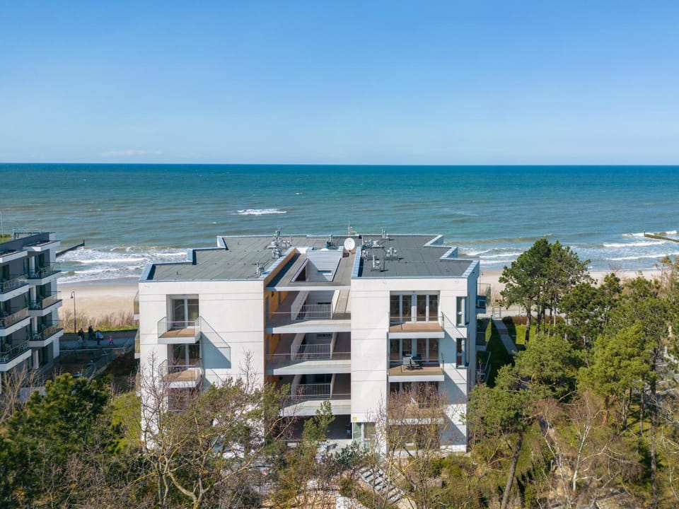 Property building, Day, Natural landscape, Beach, Sea view
