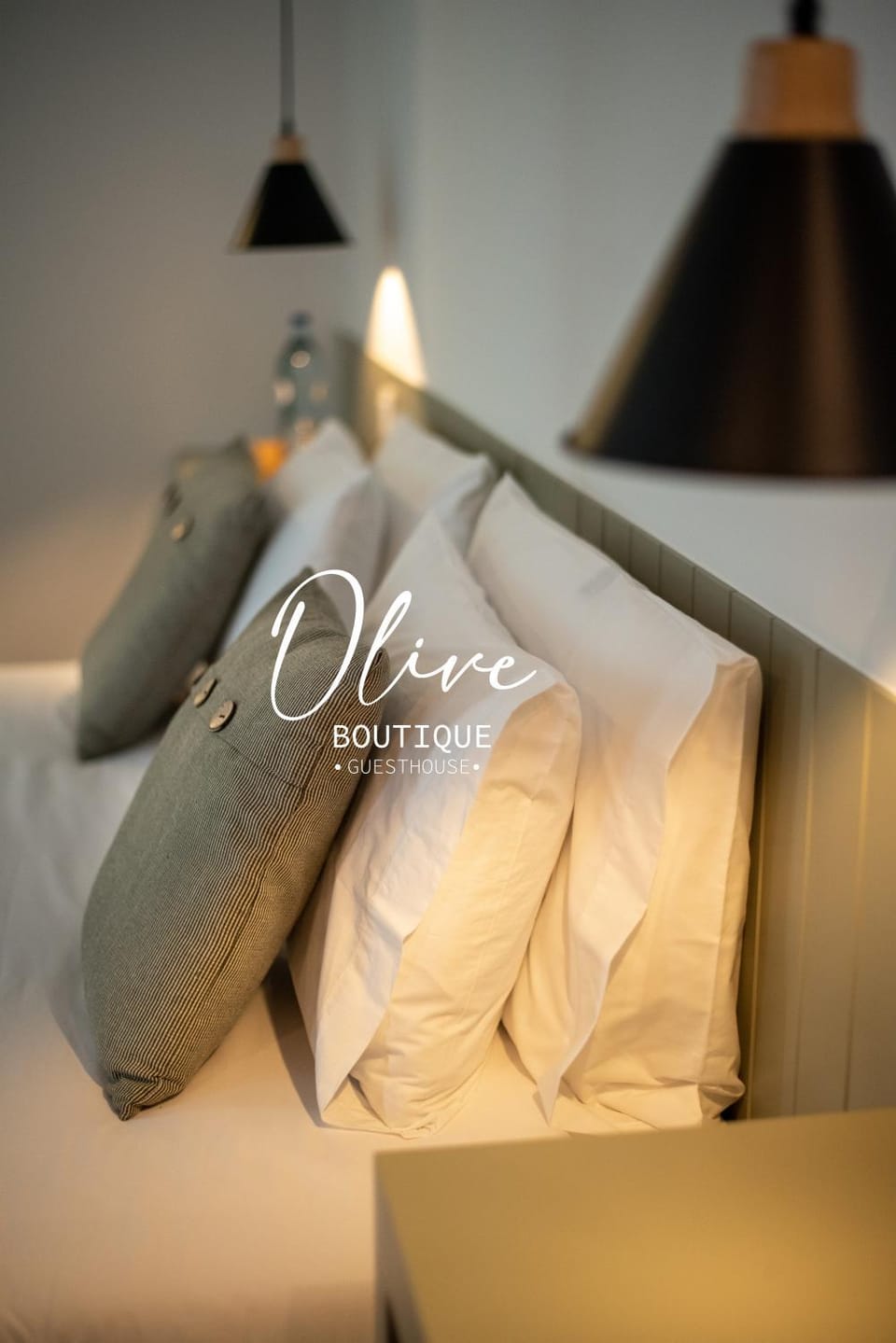 Bed, Photo of the whole room, Bedroom, Text overlay, towels