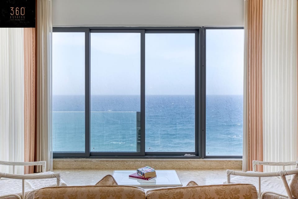 Natural landscape, Living room, Seating area, Sea view