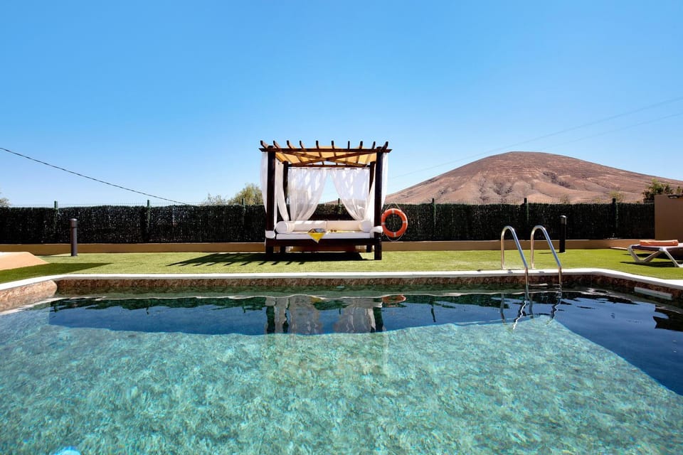 Property building, Living room, Swimming pool