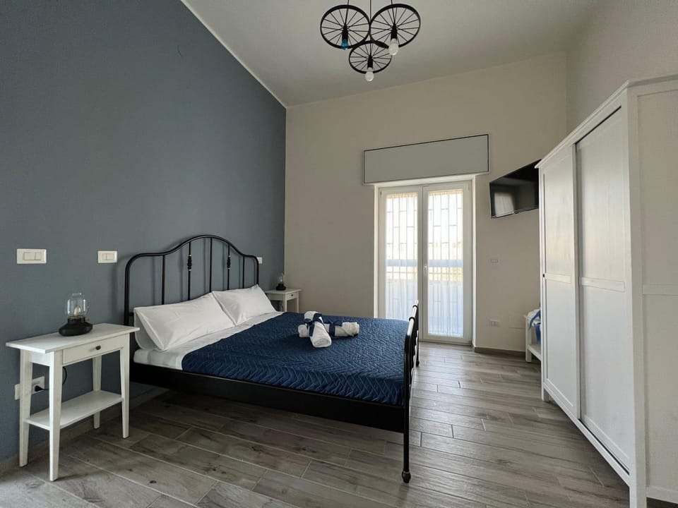 Bed, Photo of the whole room, Bedroom, towels, wardrobe
