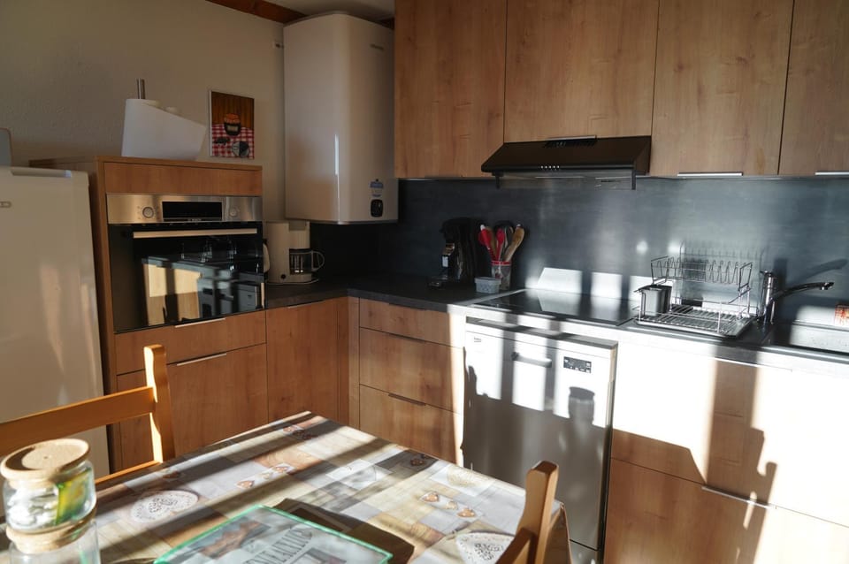 Kitchen or kitchenette, oven, stove