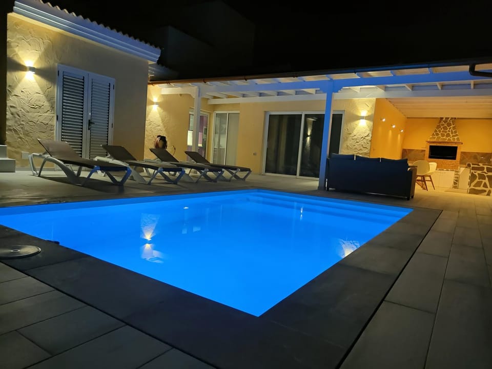 Night, Pool view, Swimming pool, sunbed