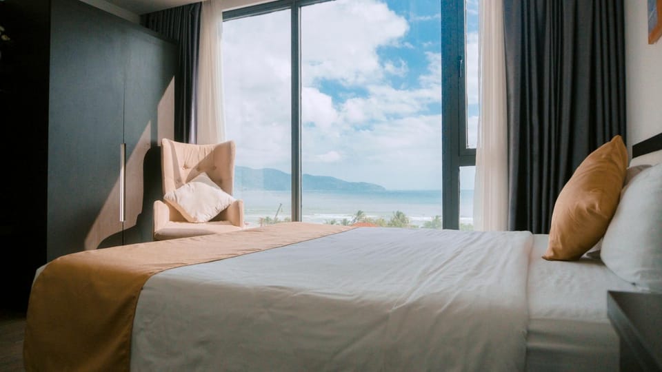 Bed, Seating area, Bedroom, Sea view