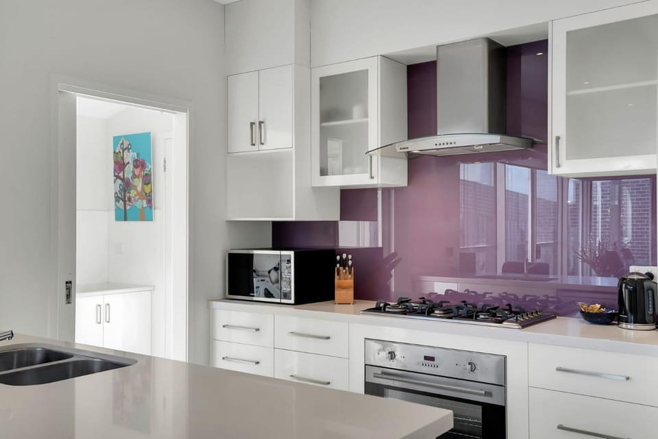 Kitchen or kitchenette, oven, stove