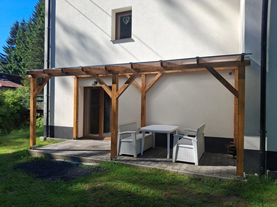 Property building, Patio, Garden, Seating area, Garden view