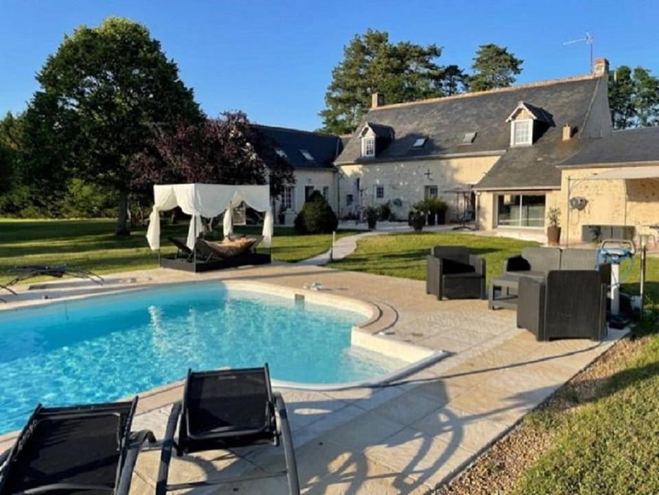 Property building, Patio, Garden, Pool view, Swimming pool, sunbed