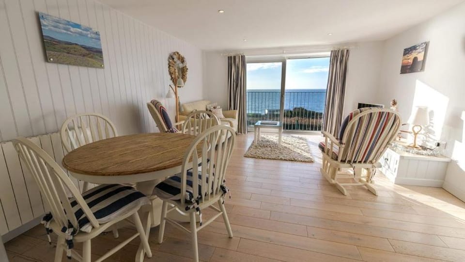 Natural landscape, Living room, Seating area, Dining area, Sea view