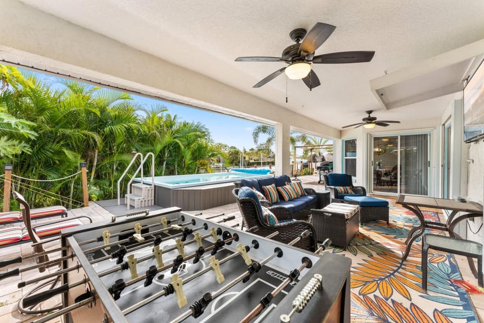 Patio, Day, Activities, Game Room, Seating area, Pool view, Swimming pool, sunbed