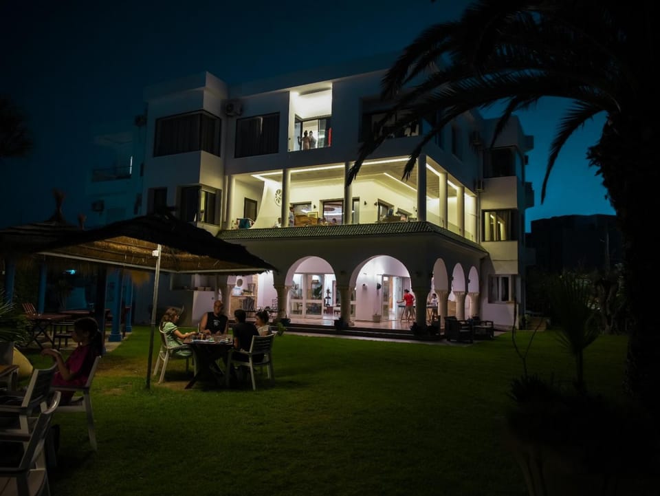 Property building, Restaurant/places to eat, Night