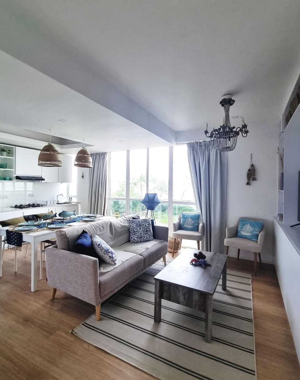 Property building, Coffee/tea facilities, Balcony/Terrace, Kitchen or kitchenette, Living room, Beach, stove, washing machine, kitchen