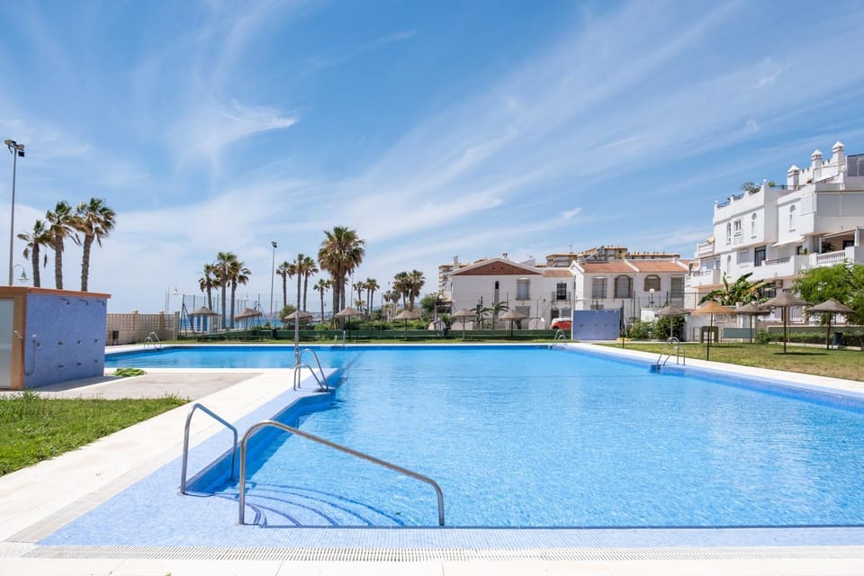 Property building, Living room, Swimming pool