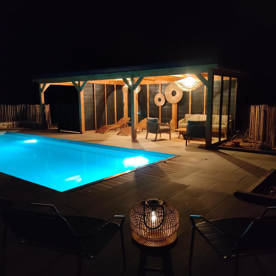 Patio, Night, Pool view, Swimming pool, sunbed