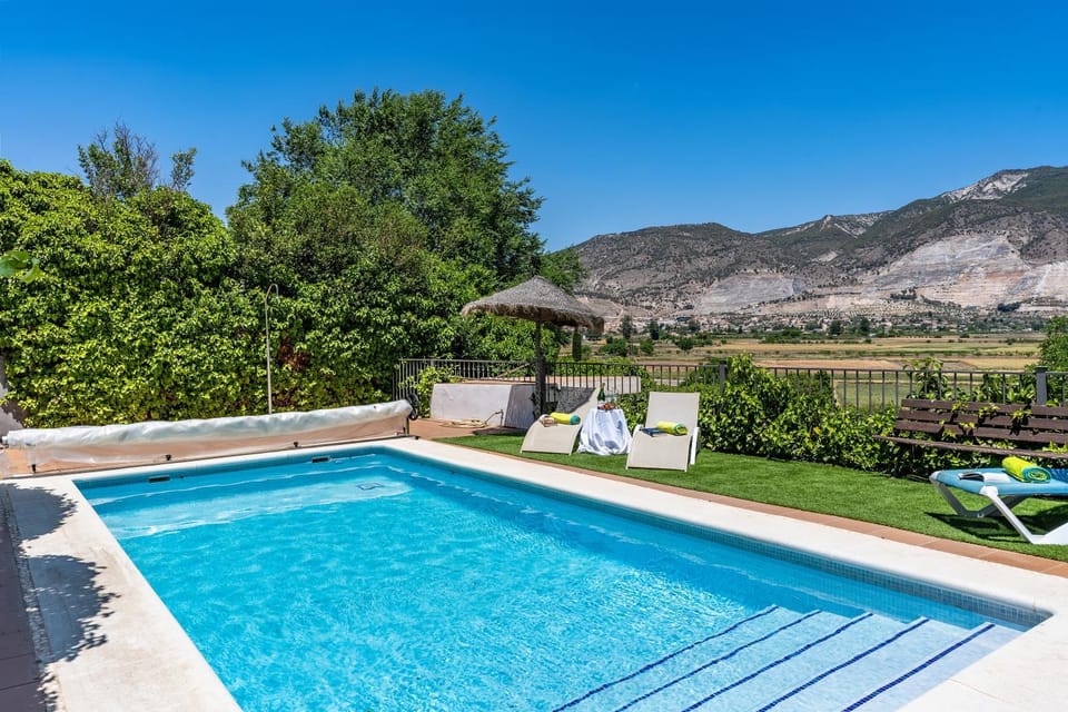 Property building, Living room, Swimming pool