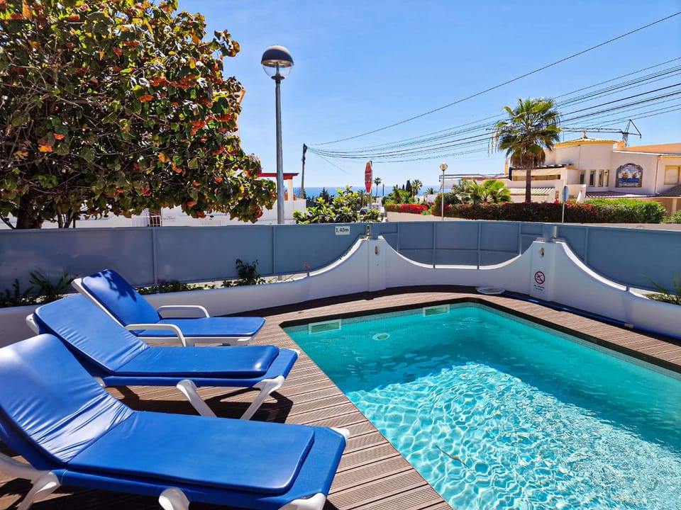 Patio, Pool view, Swimming pool, sunbed