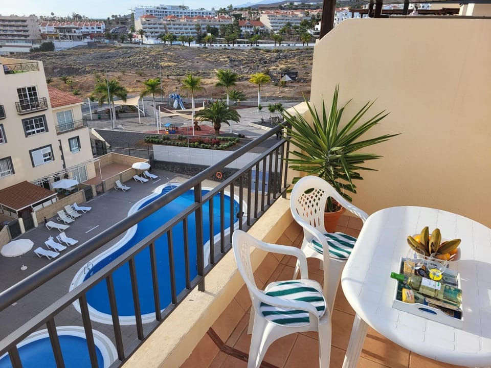 View (from property/room), Balcony/Terrace, Pool view, Swimming pool, sunbed