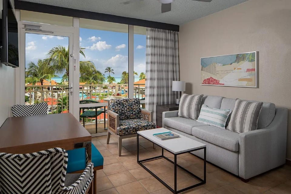 Patio, View (from property/room), Balcony/Terrace, Living room, Seating area, Dining area, Pool view