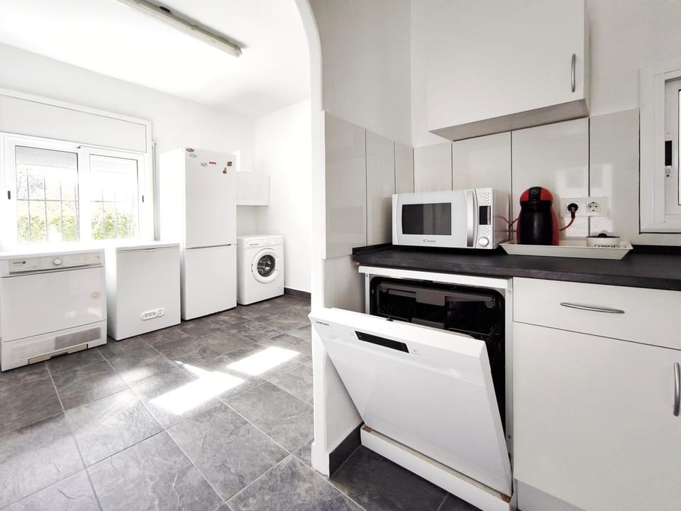 Kitchen or kitchenette, dishwasher, washing machine, dryer