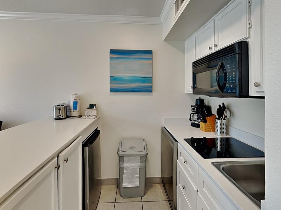 Kitchen or kitchenette, microwave, stove, toaster, kitchen