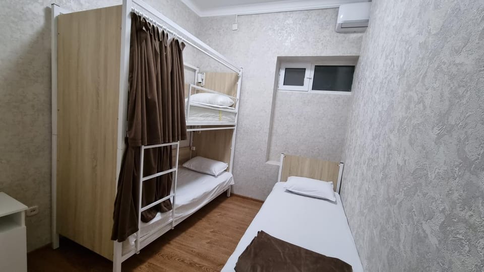 Bed, Photo of the whole room, Bedroom, bunk bed, towels, air conditioner