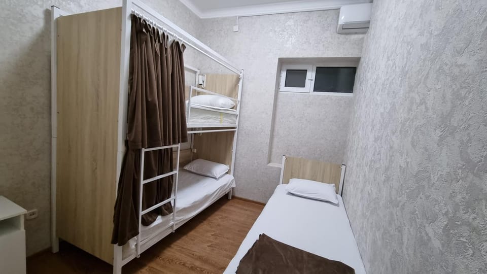 Bed, Photo of the whole room, Bedroom, bunk bed, towels, air conditioner