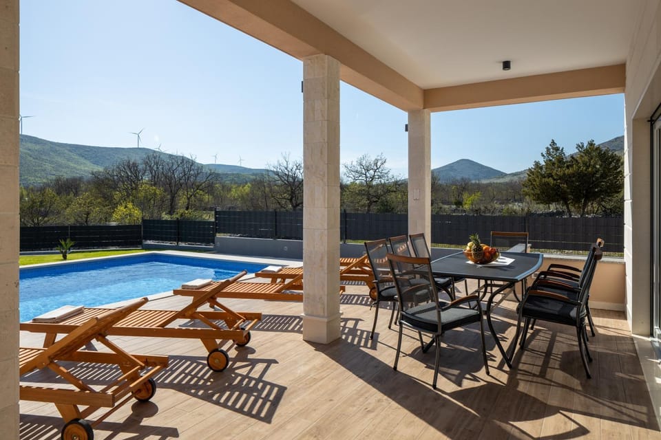 Patio, Dining area, Pool view, Swimming pool, sunbed