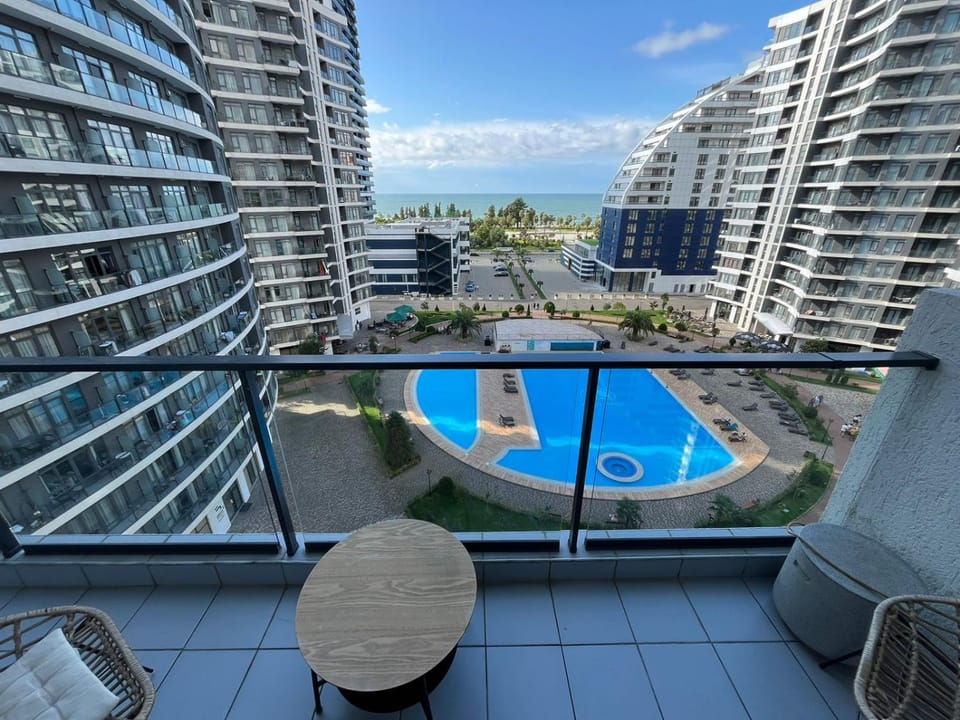 Property building, Day, View (from property/room), Pool view, Sea view
