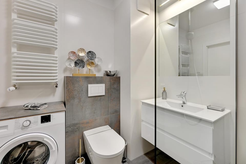 Shower, Toilet, Bathroom, towels, washing machine, dryer