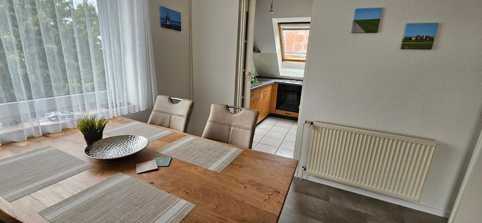Apartment "Windstärke 1" mit sonnigem Südbalkon Sauna und Parkplatz - 200m zum Deich Apartment in Schleswig-Holstein