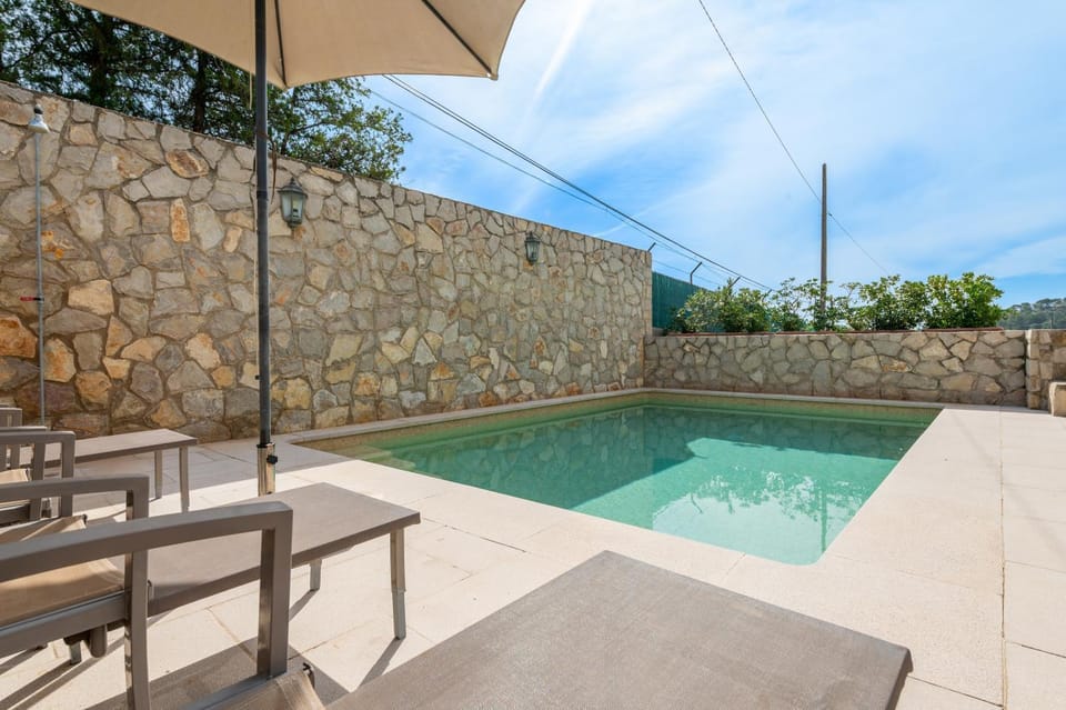 Property building, Living room, Swimming pool
