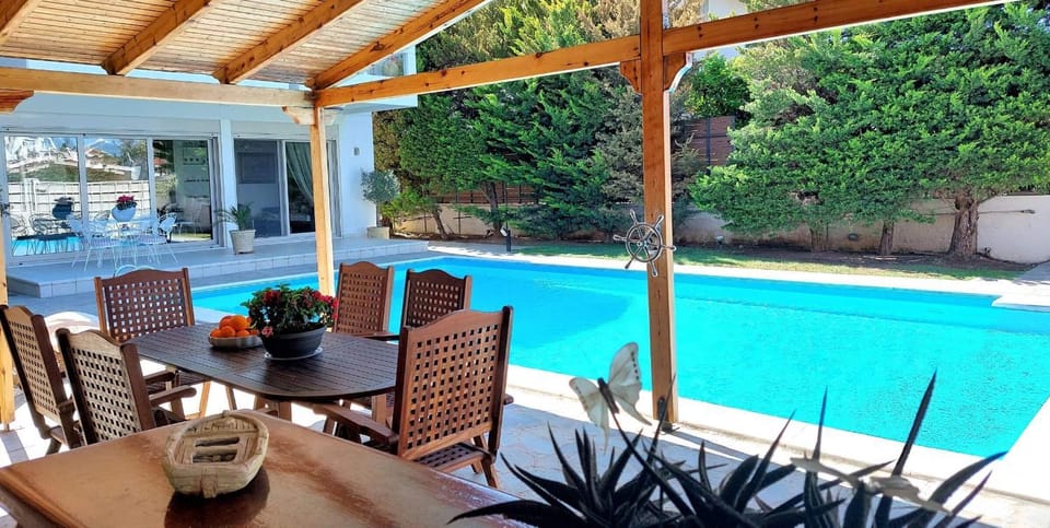 Property building, Patio, Garden, Dining area, Pool view