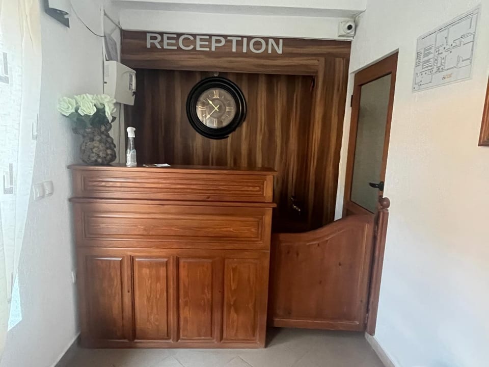 Property building, Lobby or reception, Text overlay, Location