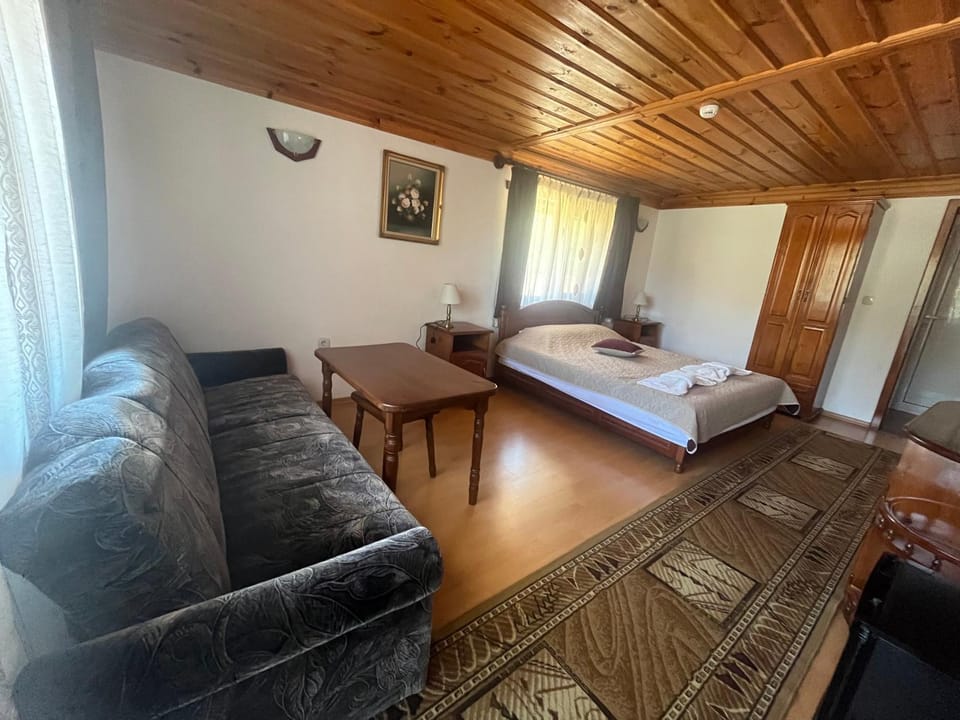 Bed, Living room, Seating area, towels, wardrobe