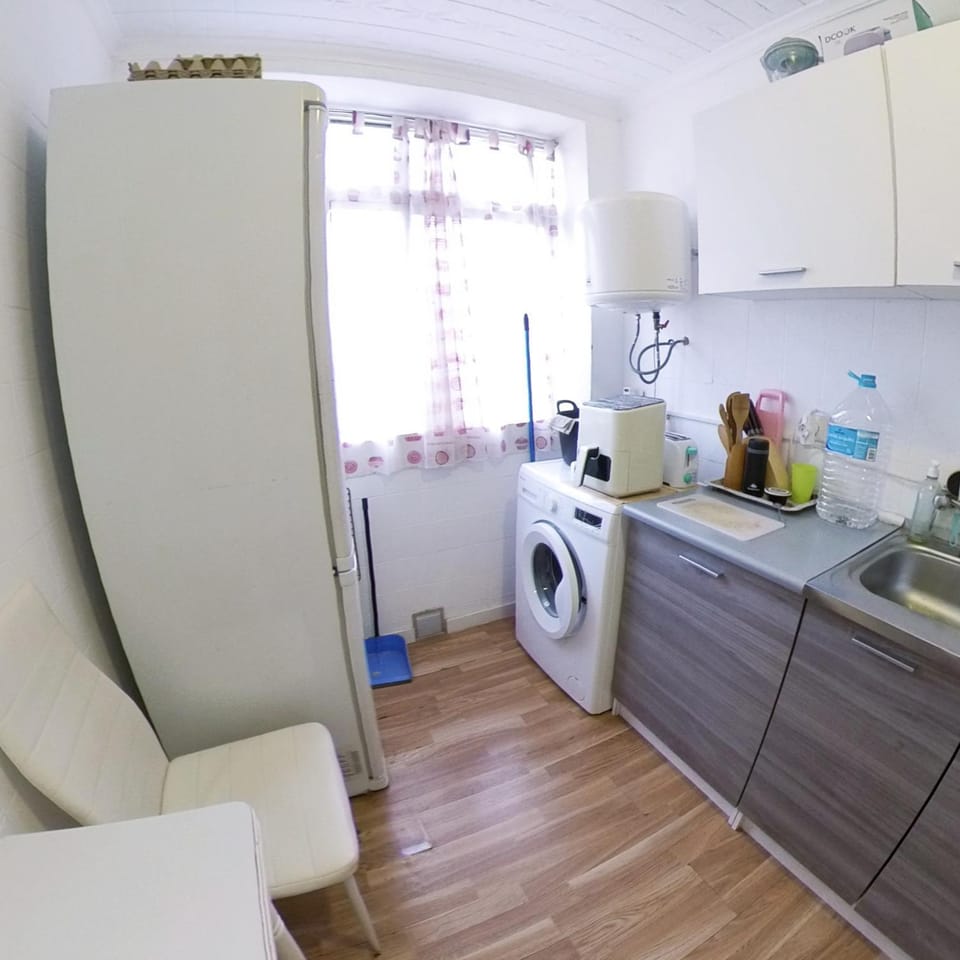 Kitchen or kitchenette, Dining area, oven, stove, toaster, washing machine