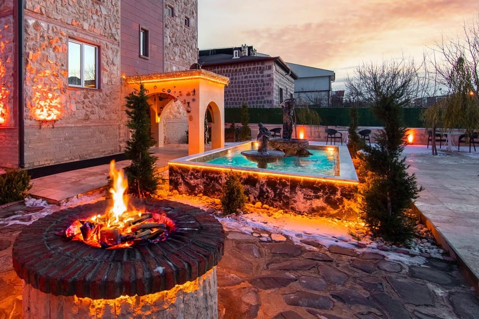 Property building, Patio, Natural landscape, BBQ facilities, Garden, Pool view, Sunrise