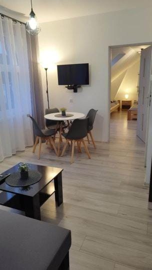 Communal lounge/ TV room, Bed, Dining area