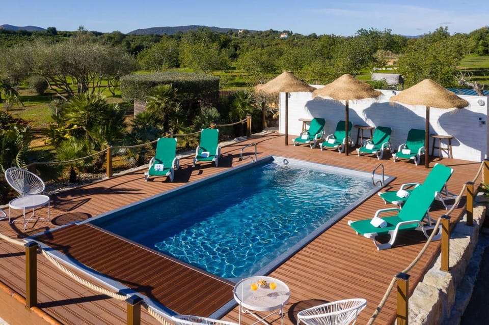 Patio, Natural landscape, Pool view, Swimming pool, sunbed