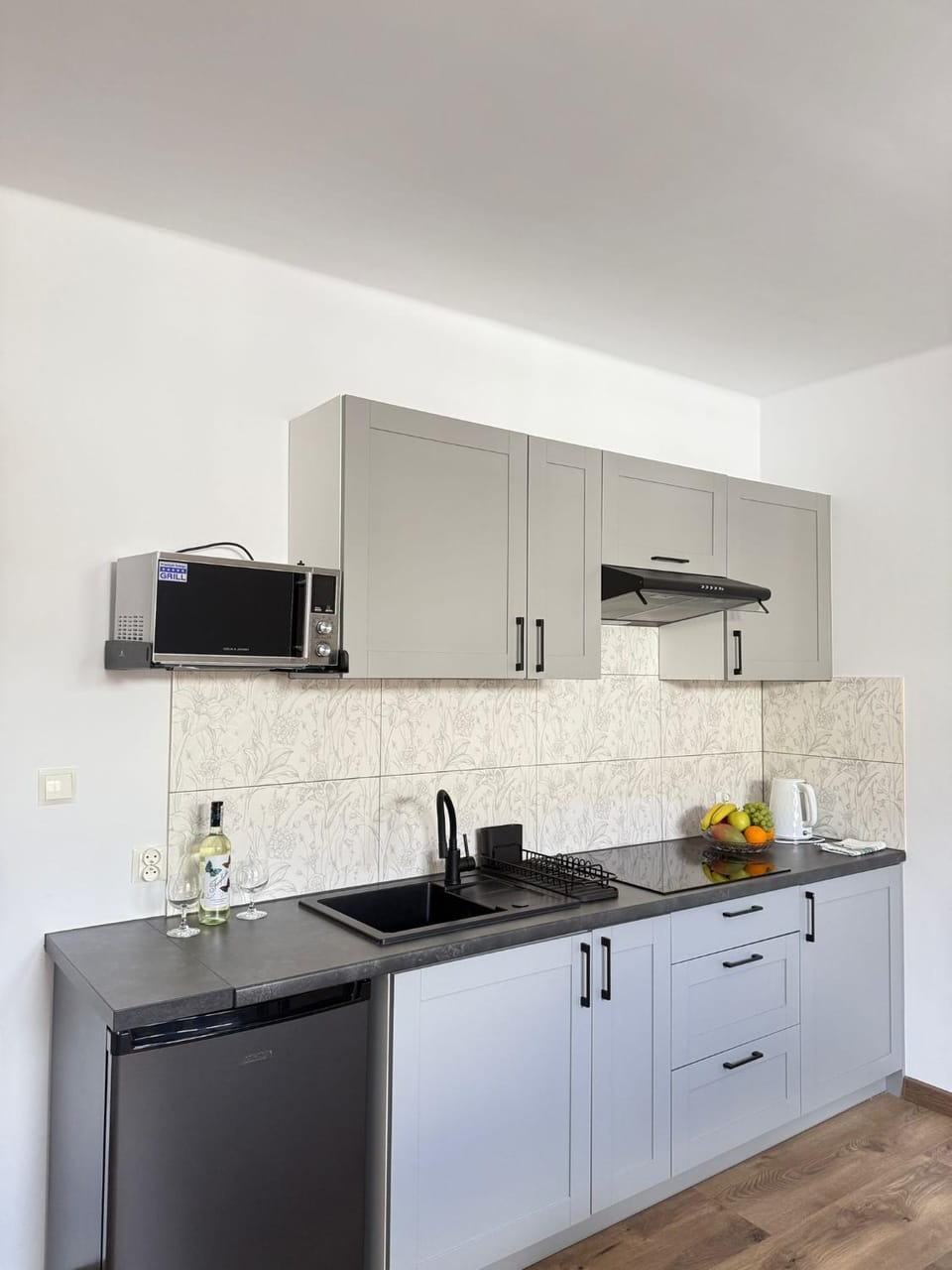 Kitchen or kitchenette, microwave, stove, kitchen